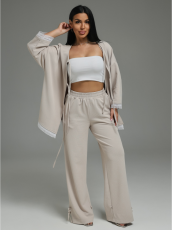 Изображение товара «Женский костюм (блузка+брюки) из трикотажа вафли «Купава [бежевый]» арт 89407» из магазина «Ивановский-Текстиль.РФ»