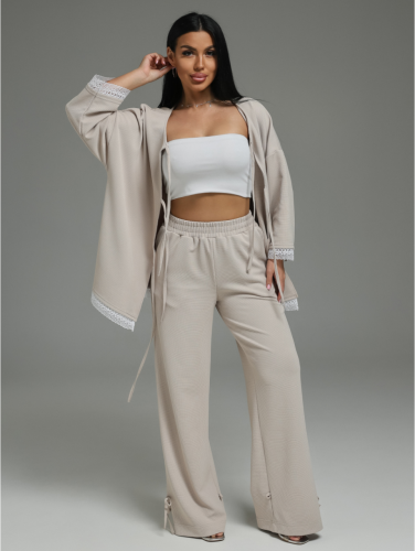Изображение товара «Женский костюм (блузка+брюки) из трикотажа вафли «Купава [бежевый]» арт 89407» из магазина «Ивановский-Текстиль.РФ»